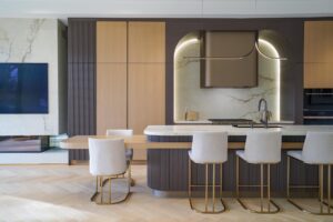 Luxury kitchen Toronto with bar seating, island, and open-concept layout